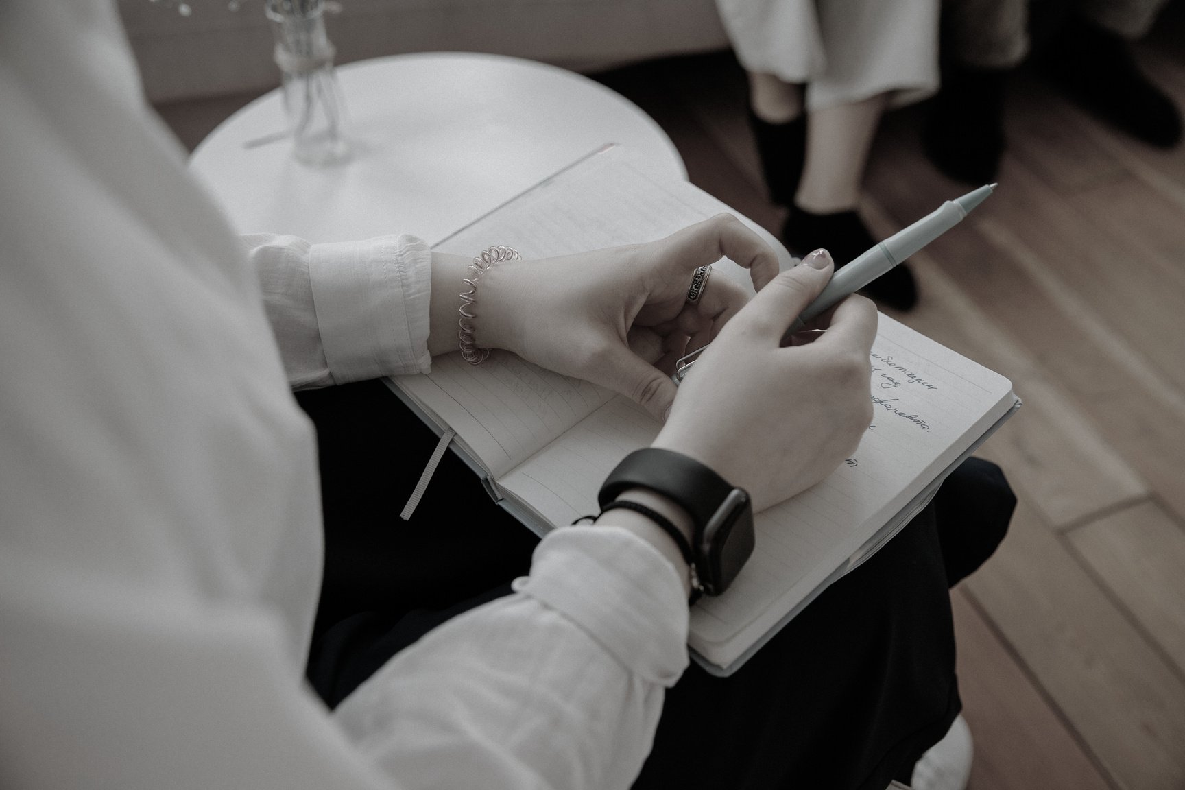 Close Up of Therapist Holding Notebook